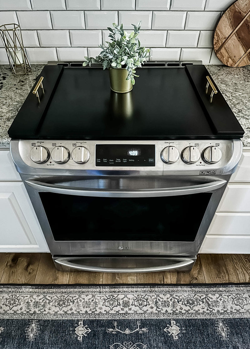 Clean and simple black stove cover. Minimalist design