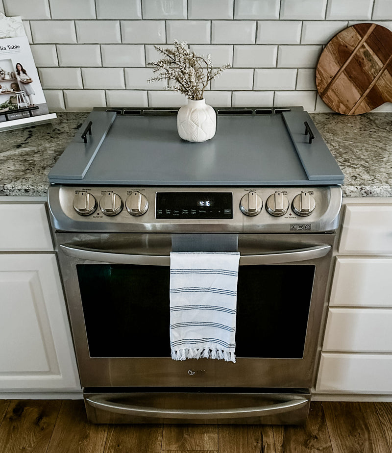 Clean and simple gray stove cover. Minimalist design