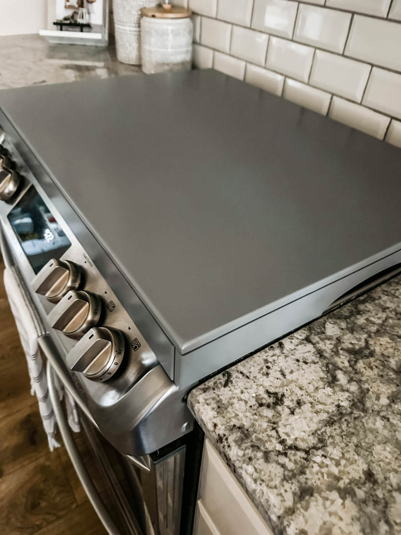 Clean and simple gray stove cover. Minimalist design
