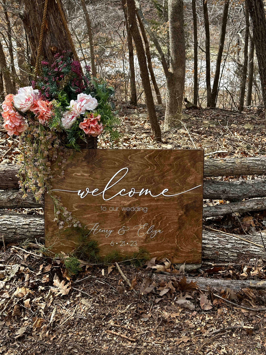Personalized "welcome to our wedding" sign in fine-line script