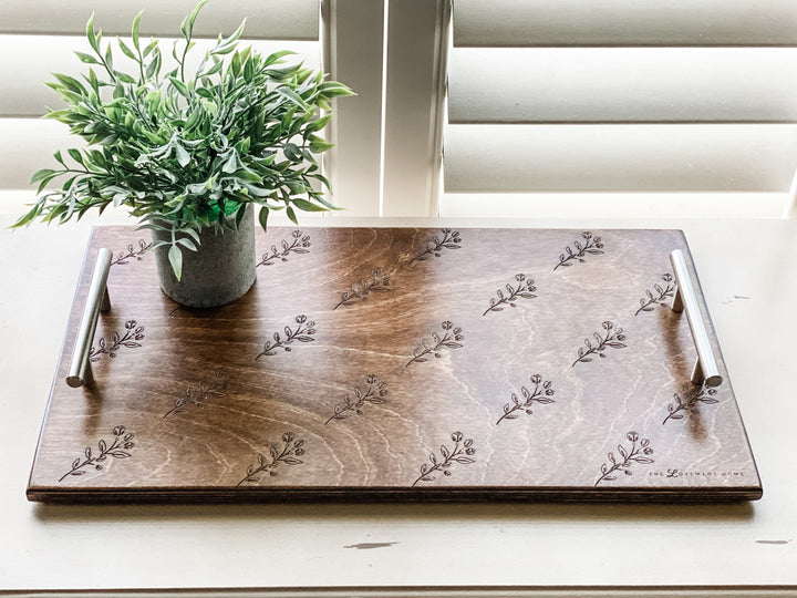 Warm brown serving tray with delicate floral motif