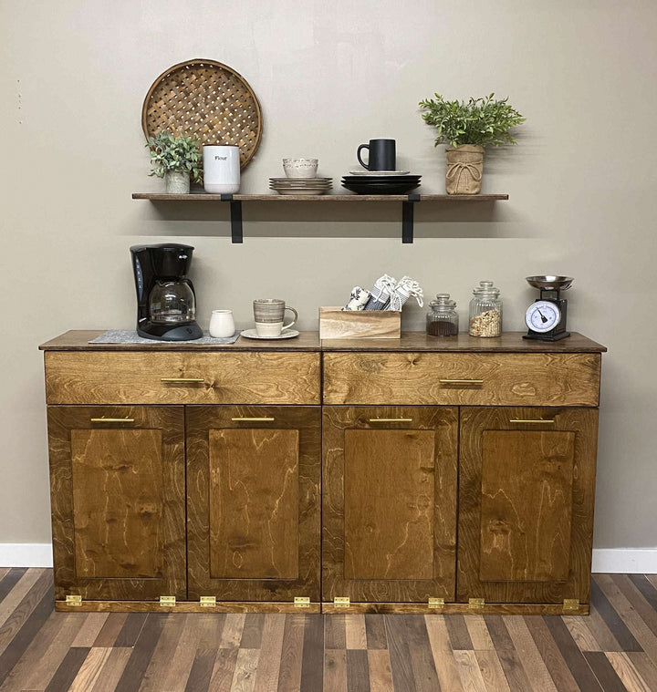 Counter tall quad trash cabinet with a storage drawer in warm brown stain