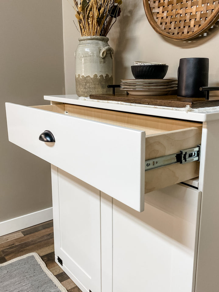 Handcrafted double hidden trash cabinet + storage drawer in white
